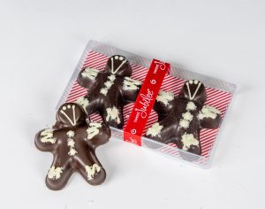 Chocolate covered people with in a gift bag