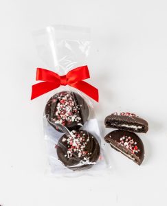 Chocolate covered oreos with peppermint in a gift bag